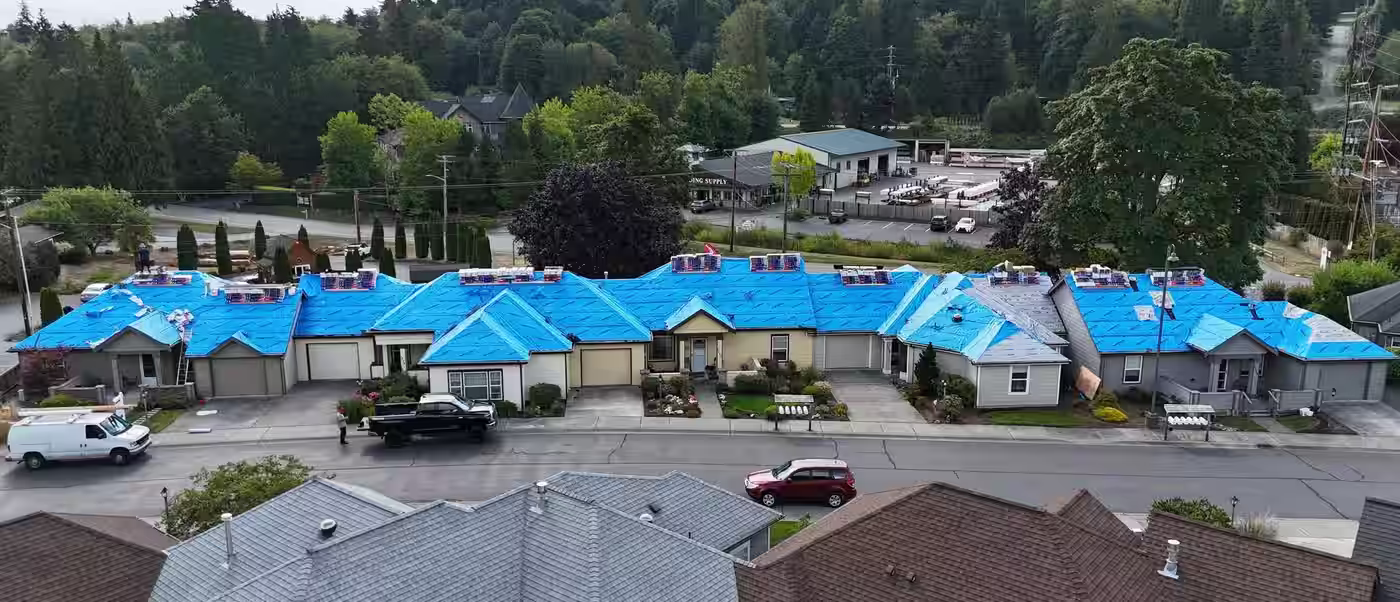 Aerial view of a Wind Proof Roofing re-roof on Whidbey Island